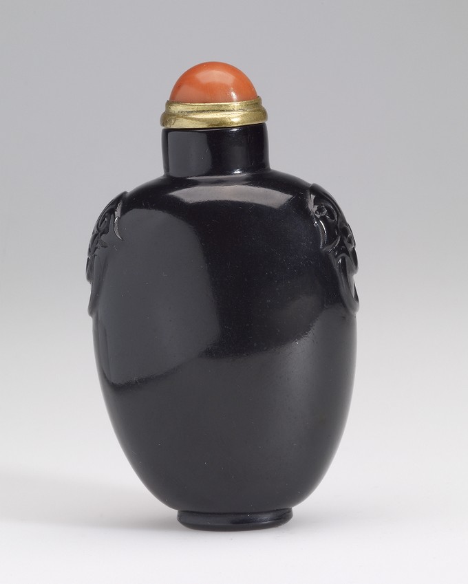 Snuff Bottle, shoulders carved with mask and ring handles