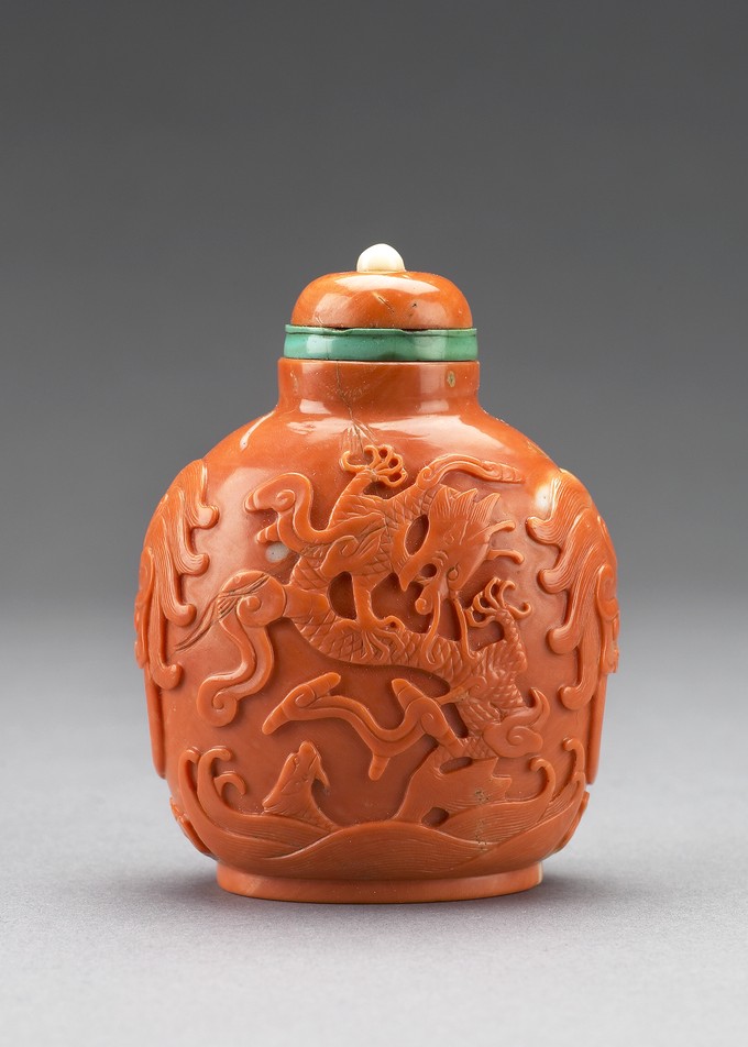 Snuff Bottle, with carved depiction of a monkey on a horse