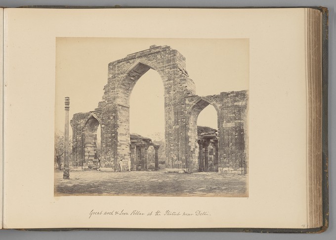 [Great arch and iron pillar at the K'útub near Delhi]   from Indian Views