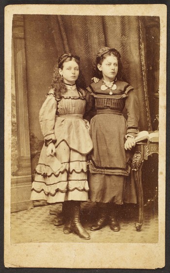 Unknown sitters [portrait of two girls standing]
