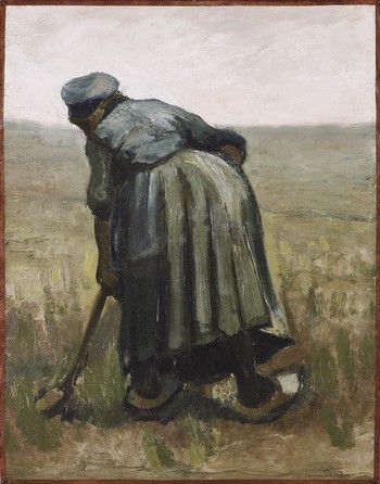 A woman with a spade, seen from behind